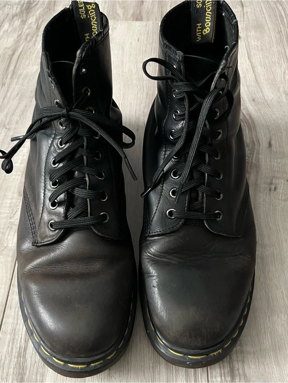 Dr. Martens Black Leather Lace-Up Combat Boots with Yellow Stitching